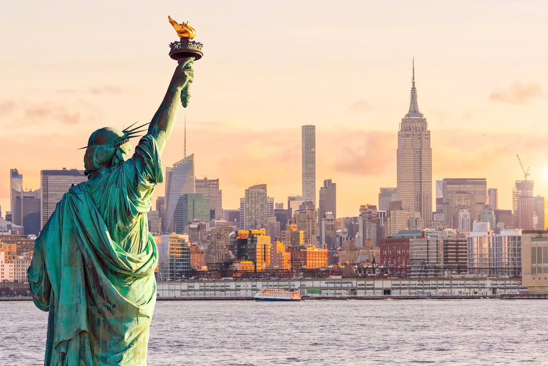 View of behind the Statue of Liberty overlooking New York City.