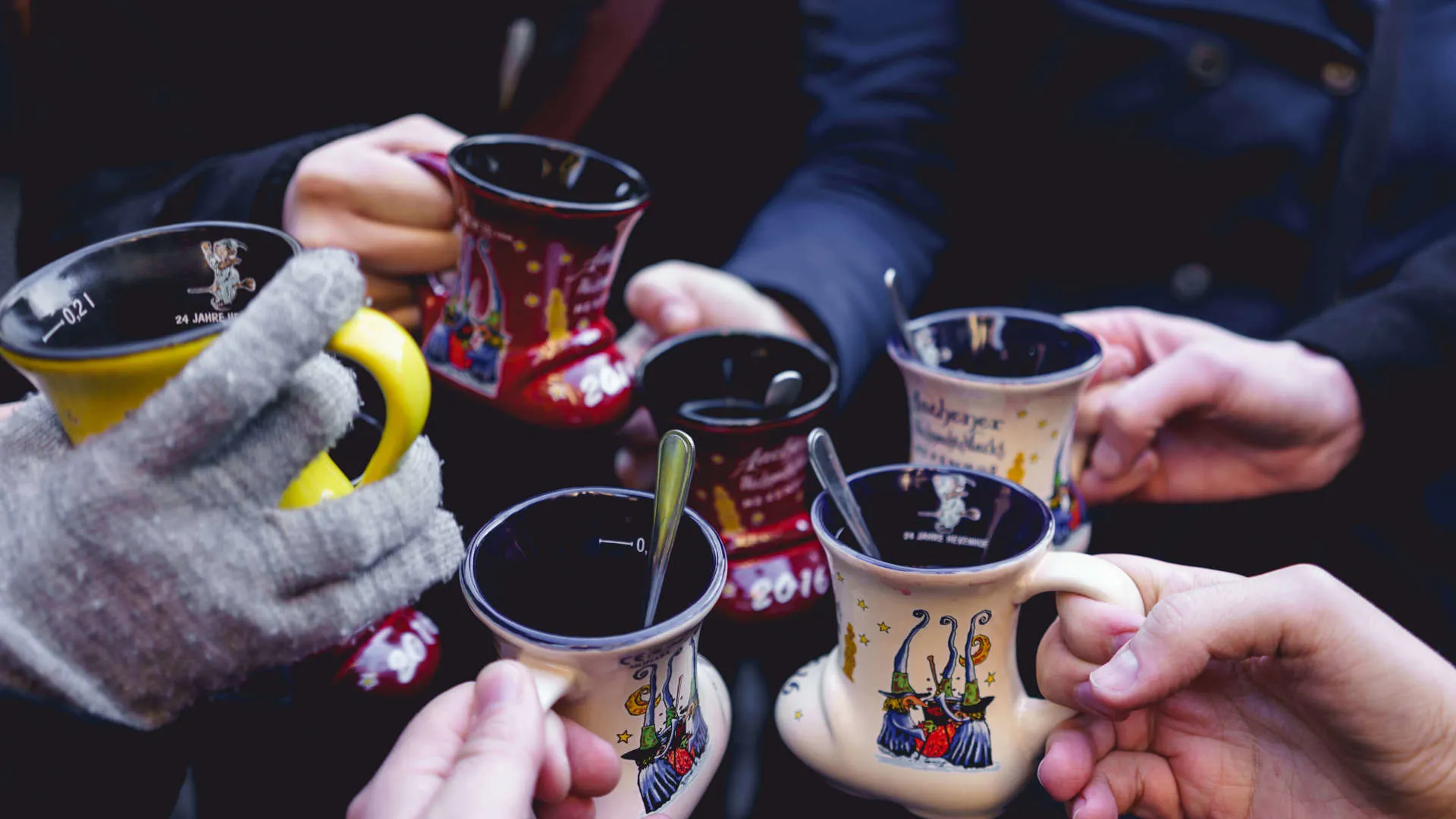 Christmas Markets Holding Cups Drinks