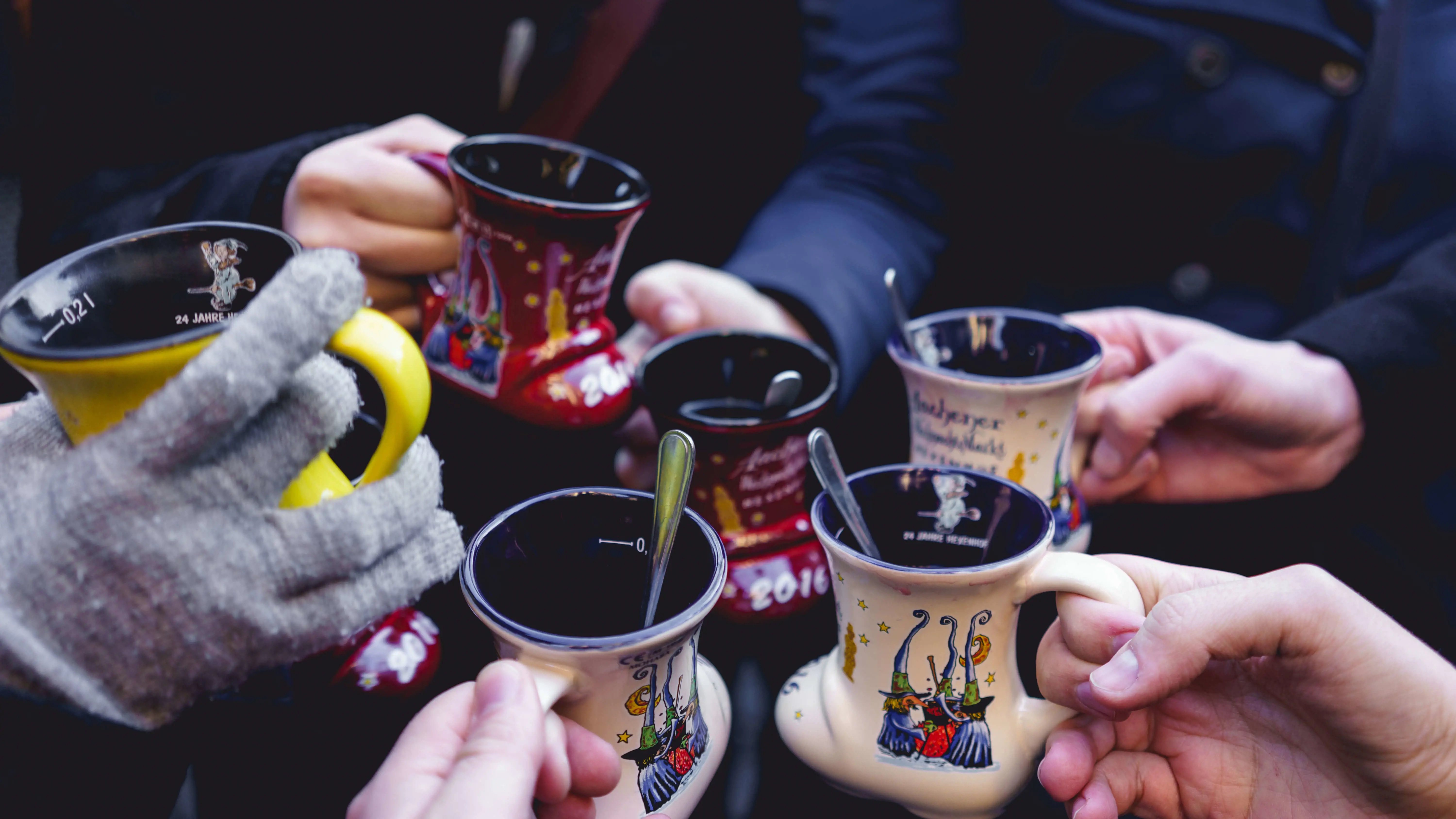 Christmas Markets Holding Cups Drinks